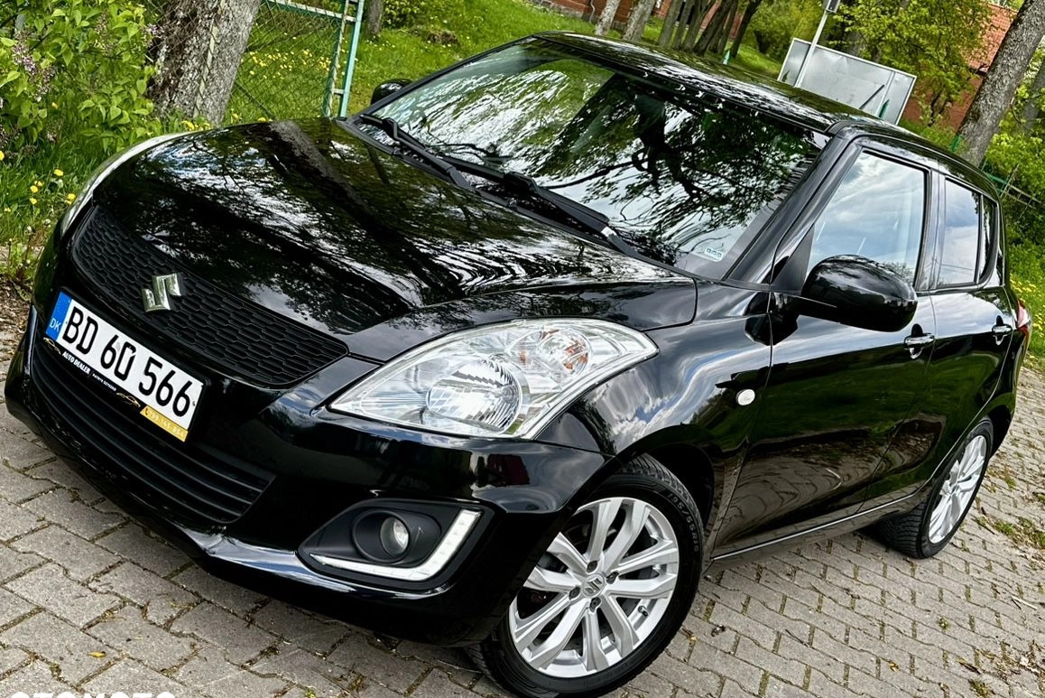 Suzuki Swift cena 27900 przebieg: 95000, rok produkcji 2014 z Bełchatów małe 22